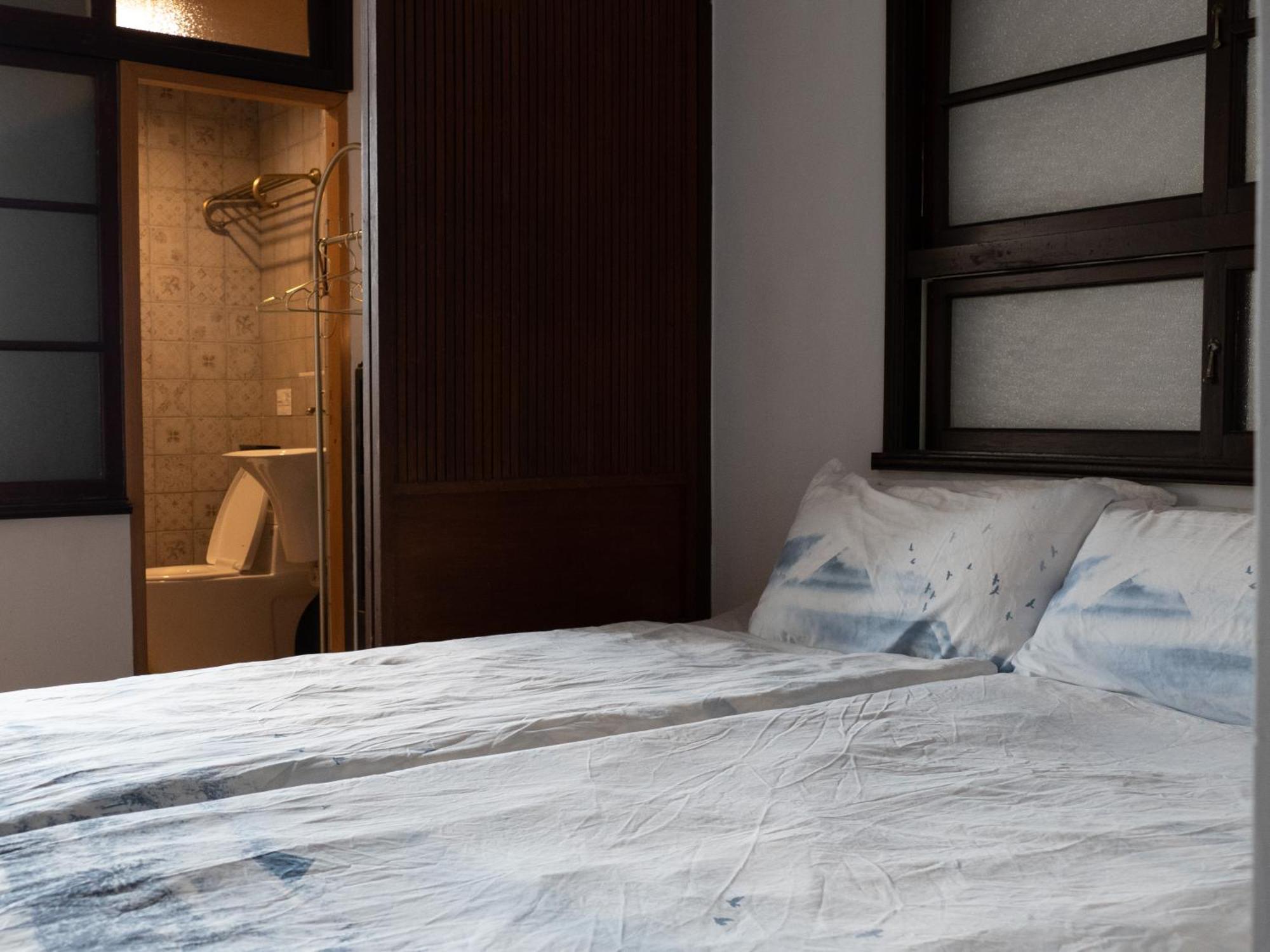 Funnan Guesthouse Tainan Rum bild